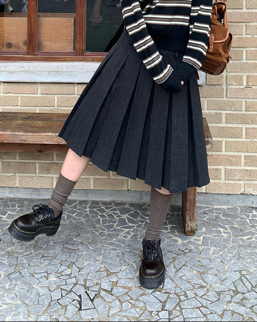 Woman standing in front of a building with 'open 7 days' sign